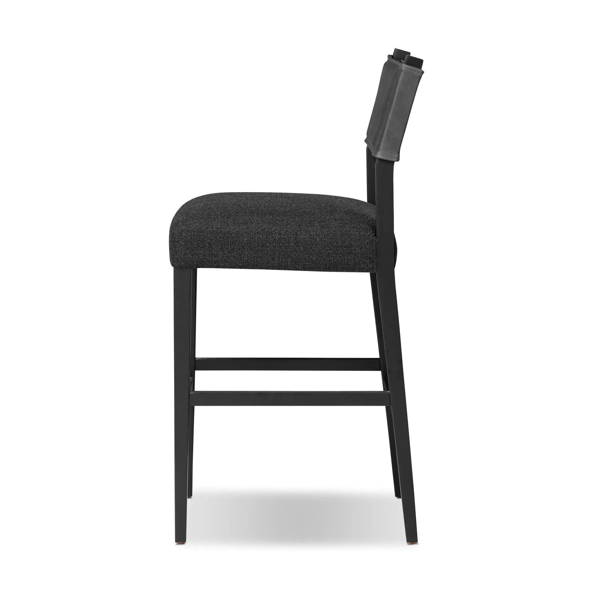 Featuring Ferris Gibson Black Bar + Counter Stool by Four Hands at Amethyst Home. Perfectly sized for the counter, black-finished parawood frames squared seating of high-performance fabric, with black top-grain leather backing. Performance fabrics are specially created to withstand spills, stains, high traffic and wear, ensuring long-term comfort and unmatc. Amethyst Home provides interior design, new home construction design consulting, vintage area rugs, and lighting in the Nashville metro area.