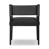Mixed materials at their finest. Black parawood frames squared seating of high-performance fabric. A top-grain leather back readies this modern-minded armchair for the head of the table. Performance fabrics are specially created to withstand spills, stains, high traffic and wear, ensuring long-term comfort and unmatched durability Amethyst Home provides interior design, new home construction design consulting, vintage area rugs, and lighting in the Alpharetta metro area.