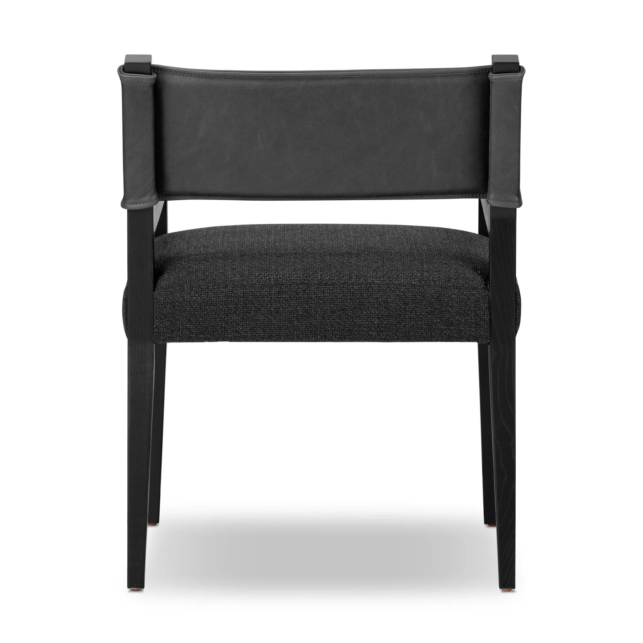 Mixed materials at their finest. Black parawood frames squared seating of high-performance fabric. A top-grain leather back readies this modern-minded armchair for the head of the table. Performance fabrics are specially created to withstand spills, stains, high traffic and wear, ensuring long-term comfort and unmatched durability Amethyst Home provides interior design, new home construction design consulting, vintage area rugs, and lighting in the Alpharetta metro area.
