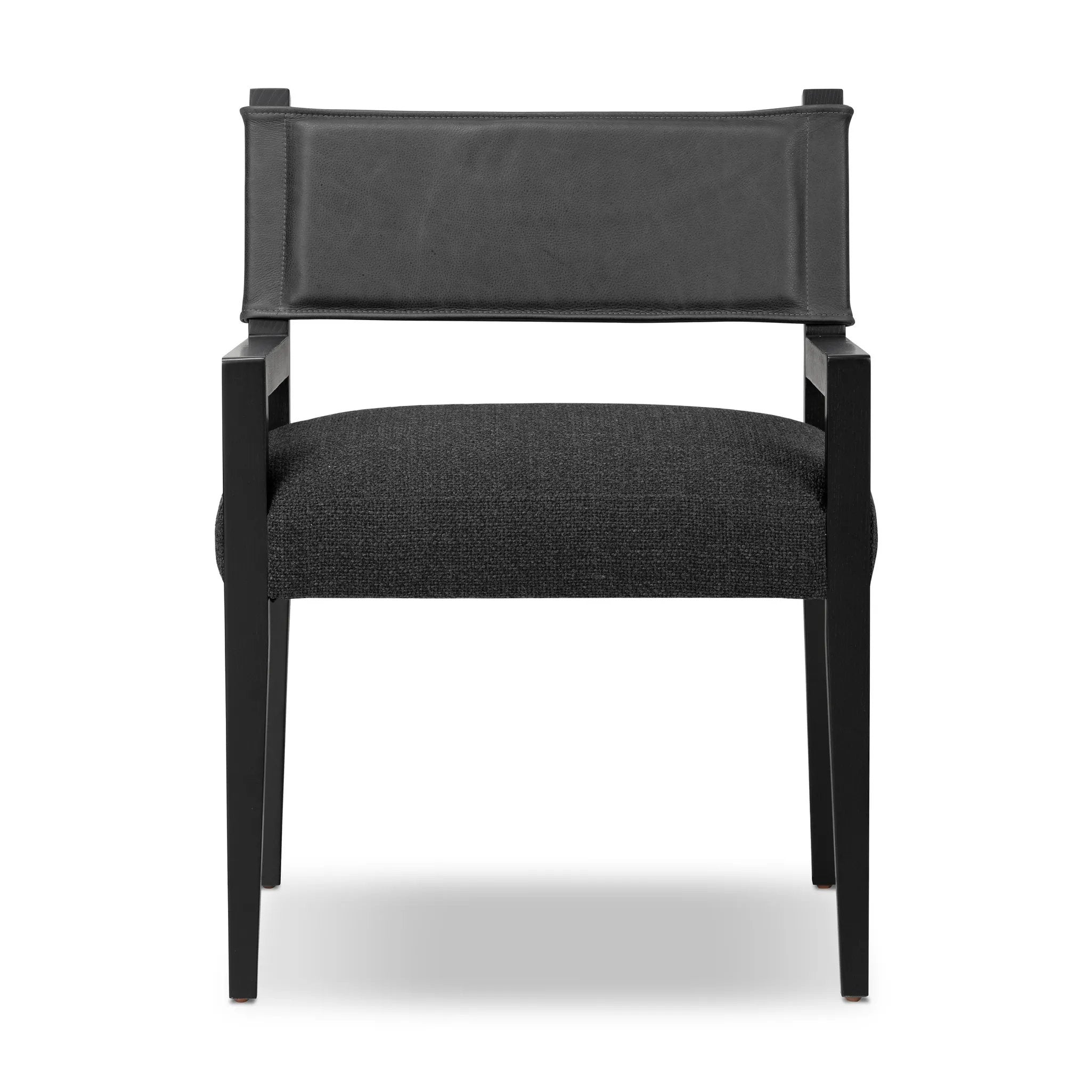 Mixed materials at their finest. Black parawood frames squared seating of high-performance fabric. A top-grain leather back readies this modern-minded armchair for the head of the table. Performance fabrics are specially created to withstand spills, stains, high traffic and wear, ensuring long-term comfort and unmatched durability Amethyst Home provides interior design, new home construction design consulting, vintage area rugs, and lighting in the Dallas metro area.