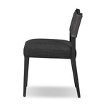 Mixed materials at their finest. Black ash forms a slight, simple frame for squared seating of neutral performance-grade upholstery. Black top-grain leather backing takes this modern-minded dining chair to the next level Amethyst Home provides interior design, new home construction design consulting, vintage area rugs, and lighting in the Houston metro area.
