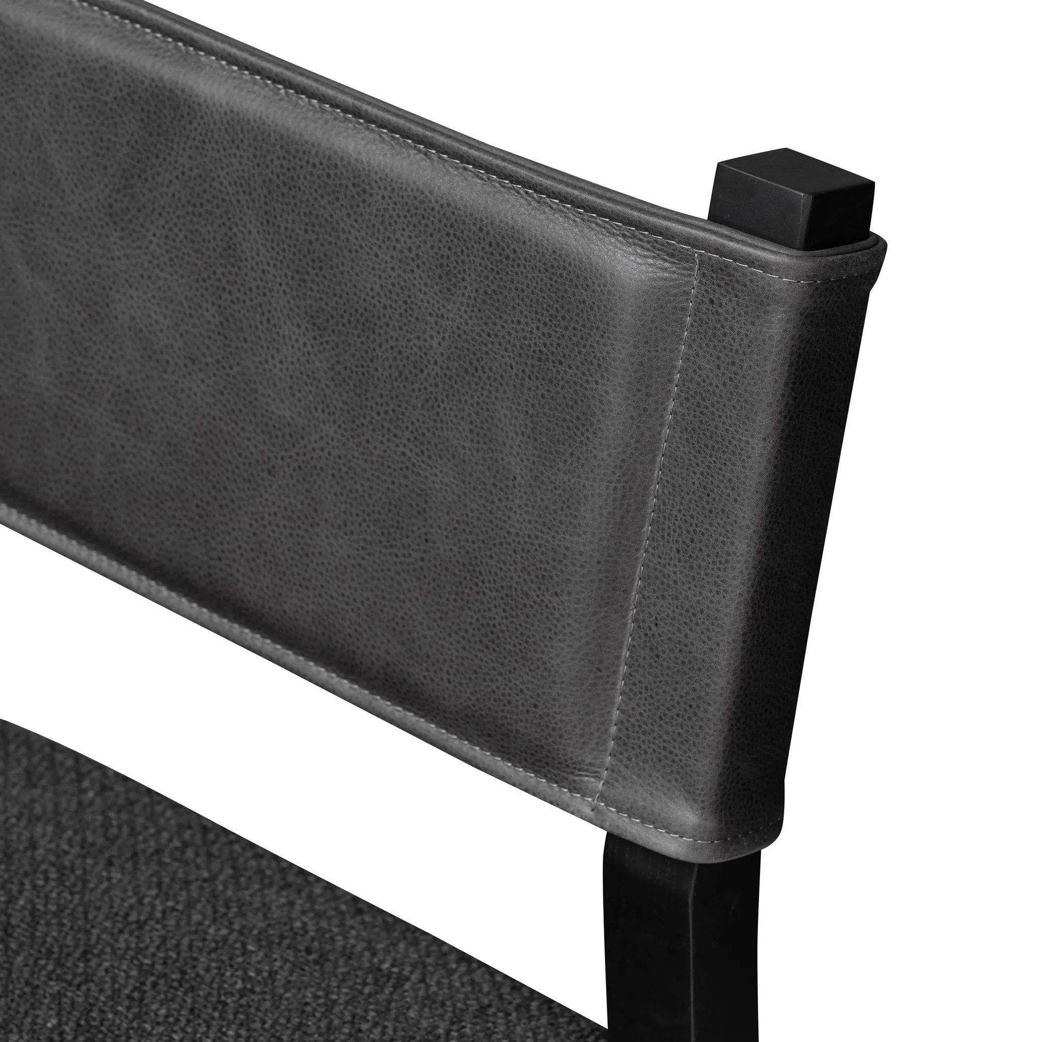 Mixed materials at their finest. Black ash forms a slight, simple frame for squared seating of neutral performance-grade upholstery. Black top-grain leather backing takes this modern-minded dining chair to the next level Amethyst Home provides interior design, new home construction design consulting, vintage area rugs, and lighting in the Scottsdale metro area.