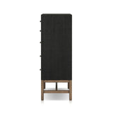 Featuring Fiona Black Raffia Tall Dresser by Four Hands at Amethyst Home. A woven black raffia dresser offers a texture-driven take on bedroom storage. Antique brass-finished hardware adds a touch of vintage detailing, all grounded by a solid mahogany base. Overall Dimensions: 34.00"w x 19.00"d x 47.50"h. Amethyst Home provides interior design, new home construction design consulting, vintage area rugs, and lighting in the Boston metro area.