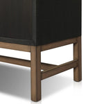 Featuring Fiona Black Raffia Tall Dresser by Four Hands at Amethyst Home. A woven black raffia dresser offers a texture-driven take on bedroom storage. Antique brass-finished hardware adds a touch of vintage detailing, all grounded by a solid mahogany base. Overall Dimensions: 34.00"w x 19.00"d x 47.50"h. Amethyst Home provides interior design, new home construction design consulting, vintage area rugs, and lighting in the Calabasas metro area.
