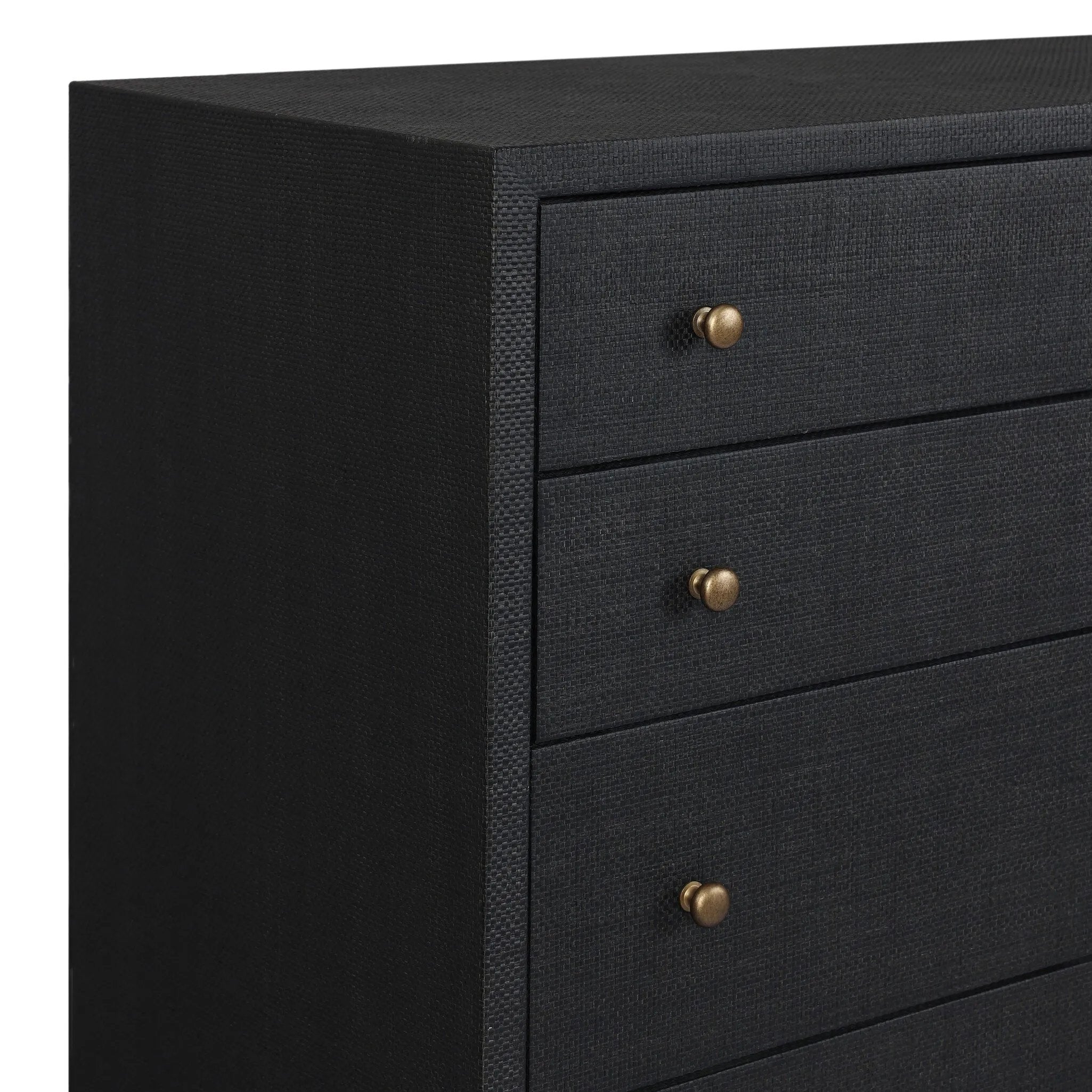 Featuring Fiona Black Raffia Tall Dresser by Four Hands at Amethyst Home. A woven black raffia dresser offers a texture-driven take on bedroom storage. Antique brass-finished hardware adds a touch of vintage detailing, all grounded by a solid mahogany base. Overall Dimensions: 34.00"w x 19.00"d x 47.50"h. Amethyst Home provides interior design, new home construction design consulting, vintage area rugs, and lighting in the Charlotte metro area.