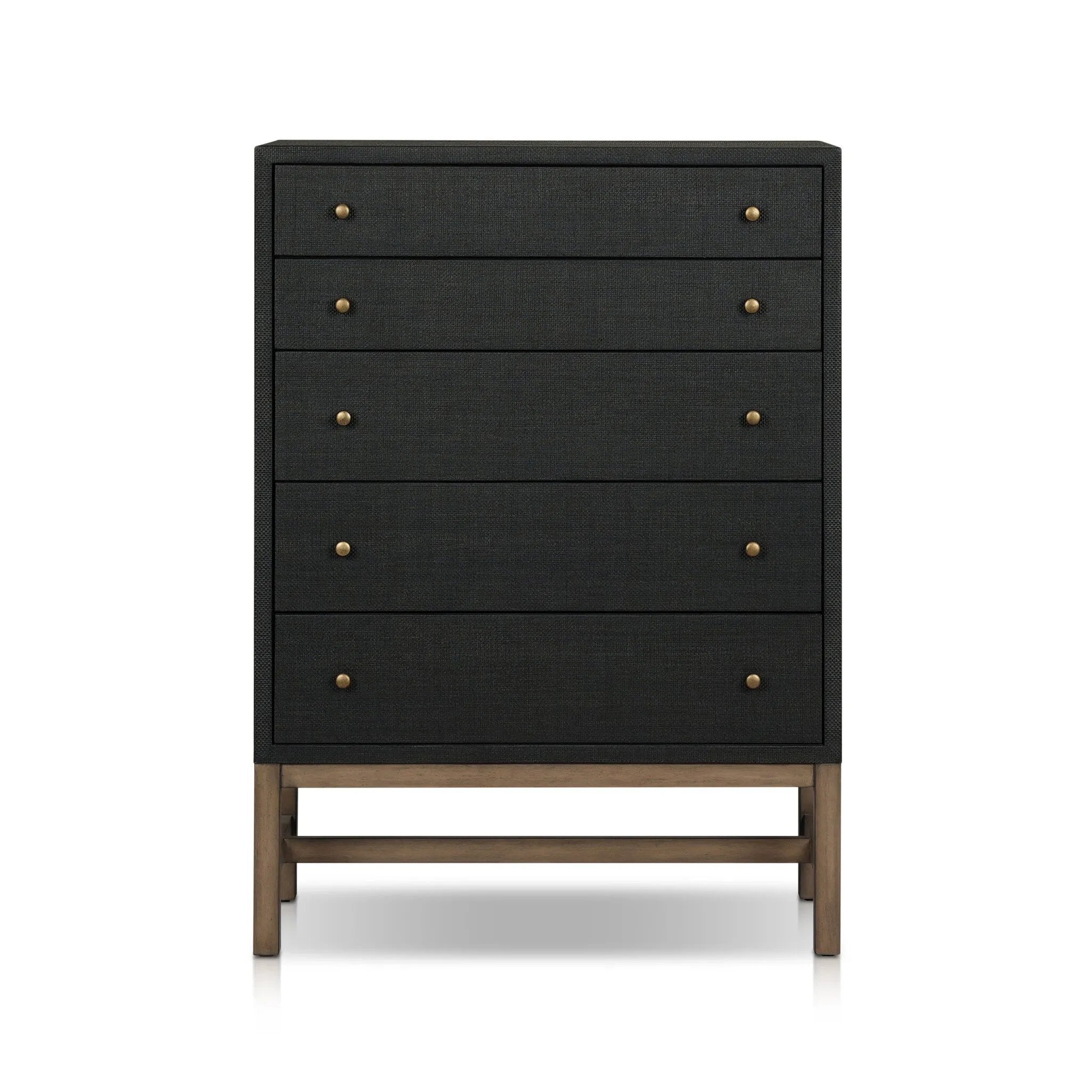 A woven black raffia dresser offers a texture-driven take on bedroom storage. Antique brass-finished hardware adds a touch of vintage detailing, all grounded by a solid mahogany base Amethyst Home provides interior design, new home construction design consulting, vintage area rugs, and lighting in the Washington metro area.
