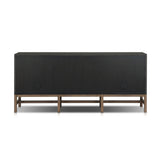 Featuring Fiona Russet Mahogany Sideboard by Four Hands at Amethyst Home. Woven black raffia places a texture-driven twist on sideboard storage. Five roomy drawers and two cabinets feature simple hardware finished in an antique brass, all supported by an open, airy base of solid mahogany.Overall Dimensions: 78.00"w x 18.00"d x 34.50"hWeight : 197.75 lbsMat. Amethyst Home provides interior design, new home construction design consulting, vintage area rugs, and lighting in the Alpharetta metro area.