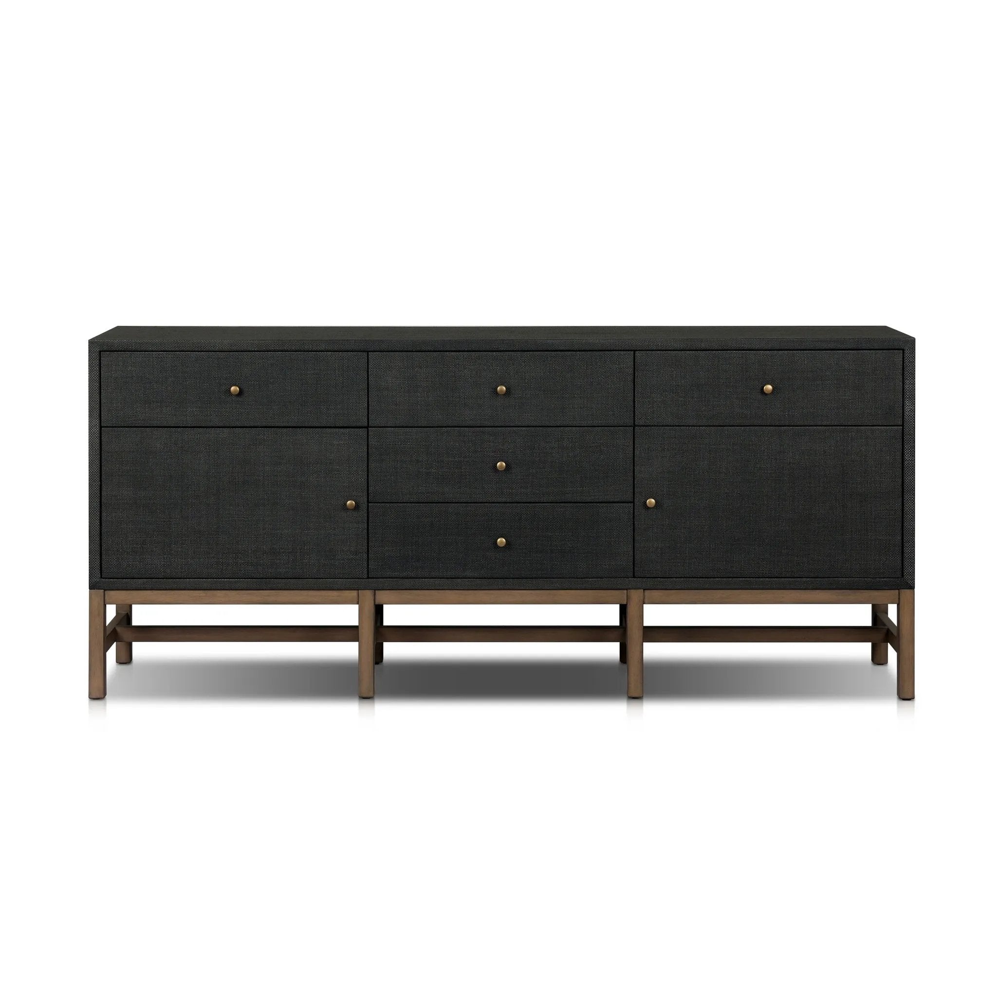 Featuring Fiona Russet Mahogany Sideboard by Four Hands at Amethyst Home. Woven black raffia places a texture-driven twist on sideboard storage. Five roomy drawers and two cabinets feature simple hardware finished in an antique brass, all supported by an open, airy base of solid mahogany.Overall Dimensions: 78.00"w x 18.00"d x 34.50"hWeight : 197.75 lbsMate. Amethyst Home provides interior design, new home construction design consulting, vintage area rugs, and lighting in the Charlotte metro area.