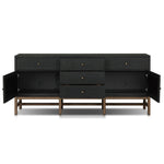 Featuring Fiona Russet Mahogany Sideboard by Four Hands at Amethyst Home. Woven black raffia places a texture-driven twist on sideboard storage. Five roomy drawers and two cabinets feature simple hardware finished in an antique brass, all supported by an open, airy base of solid mahogany.Overall Dimensions: 78.00"w x 18.00"d x 34.50"hWeight : 197.75 lbsMat. Amethyst Home provides interior design, new home construction design consulting, vintage area rugs, and lighting in the Des Moines metro area.