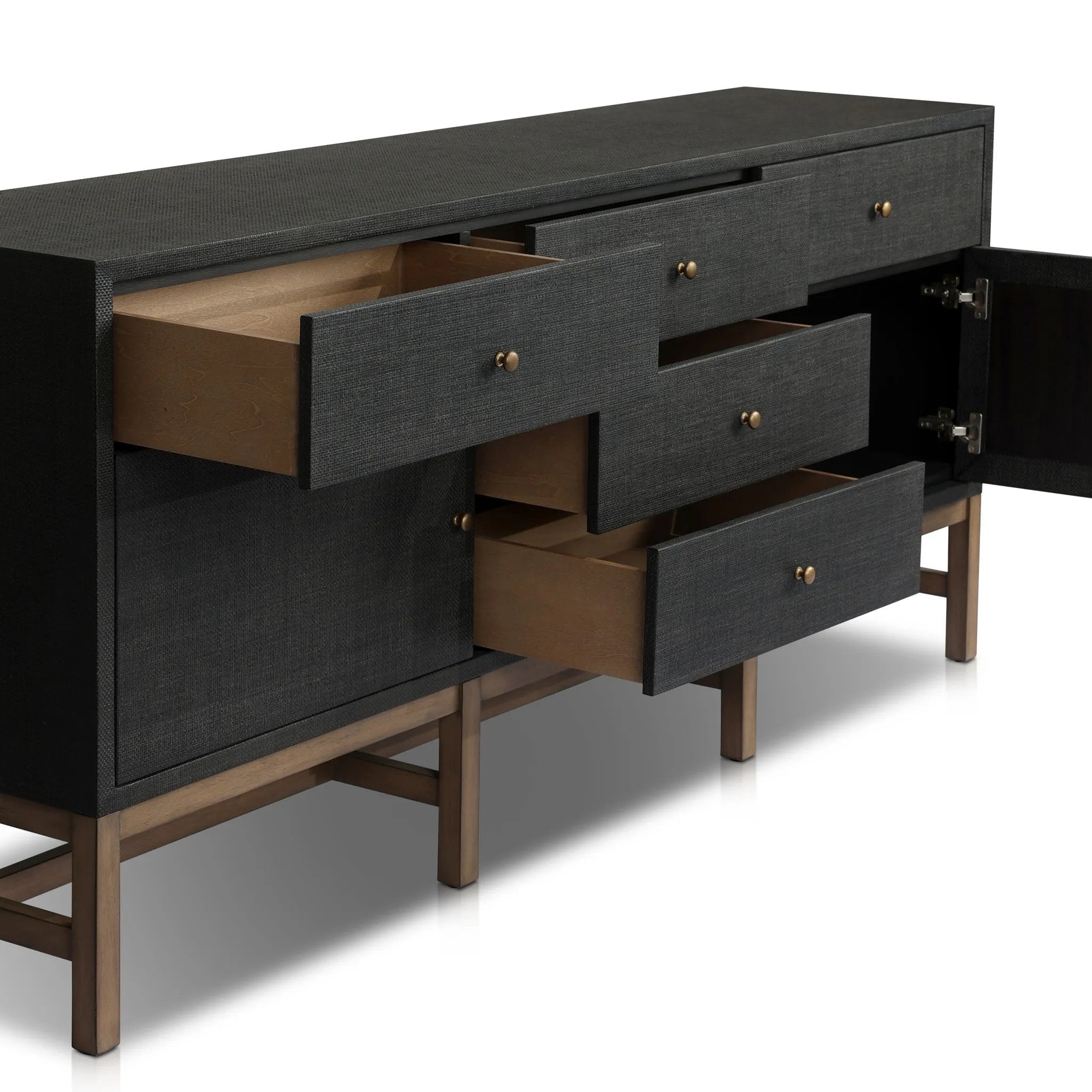 Featuring Fiona Russet Mahogany Sideboard by Four Hands at Amethyst Home. Woven black raffia places a texture-driven twist on sideboard storage. Five roomy drawers and two cabinets feature simple hardware finished in an antique brass, all supported by an open, airy base of solid mahogany.Overall Dimensions: 78.00"w x 18.00"d x 34.50"hWeight : 197.75 lbsMaterial. Amethyst Home provides interior design, new home construction design consulting, vintage area rugs, and lighting in the Omaha metro area.