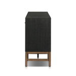 Featuring Fiona Russet Mahogany Sideboard by Four Hands at Amethyst Home. Woven black raffia places a texture-driven twist on sideboard storage. Five roomy drawers and two cabinets feature simple hardware finished in an antique brass, all supported by an open, airy base of solid mahogany.Overall Dimensions: 78.00"w x 18.00"d x 34.50"hWeight : 197.75 lbsMat. Amethyst Home provides interior design, new home construction design consulting, vintage area rugs, and lighting in the Washington metro area.
