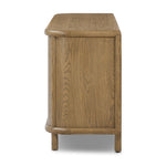 Featuring Florent Amber Oak Sideboard by Four Hands at Amethyst Home. The Florent Amber Oak Sideboard is a versatile and functional addition to any home. Crafted with high-quality materials, this sideboard provides ample storage space and a stylish aesthetic. Perfect for organizing your home and showcasing your personal style, this sideboard is a must-have. Amethyst Home provides interior design, new home construction design consulting, vintage area rugs, and lighting in the Washington metro area.