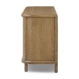 Featuring Florent Amber Oak Sideboard by Four Hands at Amethyst Home. The Florent Amber Oak Sideboard is a versatile and functional addition to any home. Crafted with high-quality materials, this sideboard provides ample storage space and a stylish aesthetic. Perfect for organizing your home and showcasing your personal style, this sideboard is a must-have. Amethyst Home provides interior design, new home construction design consulting, vintage area rugs, and lighting in the Washington metro area.