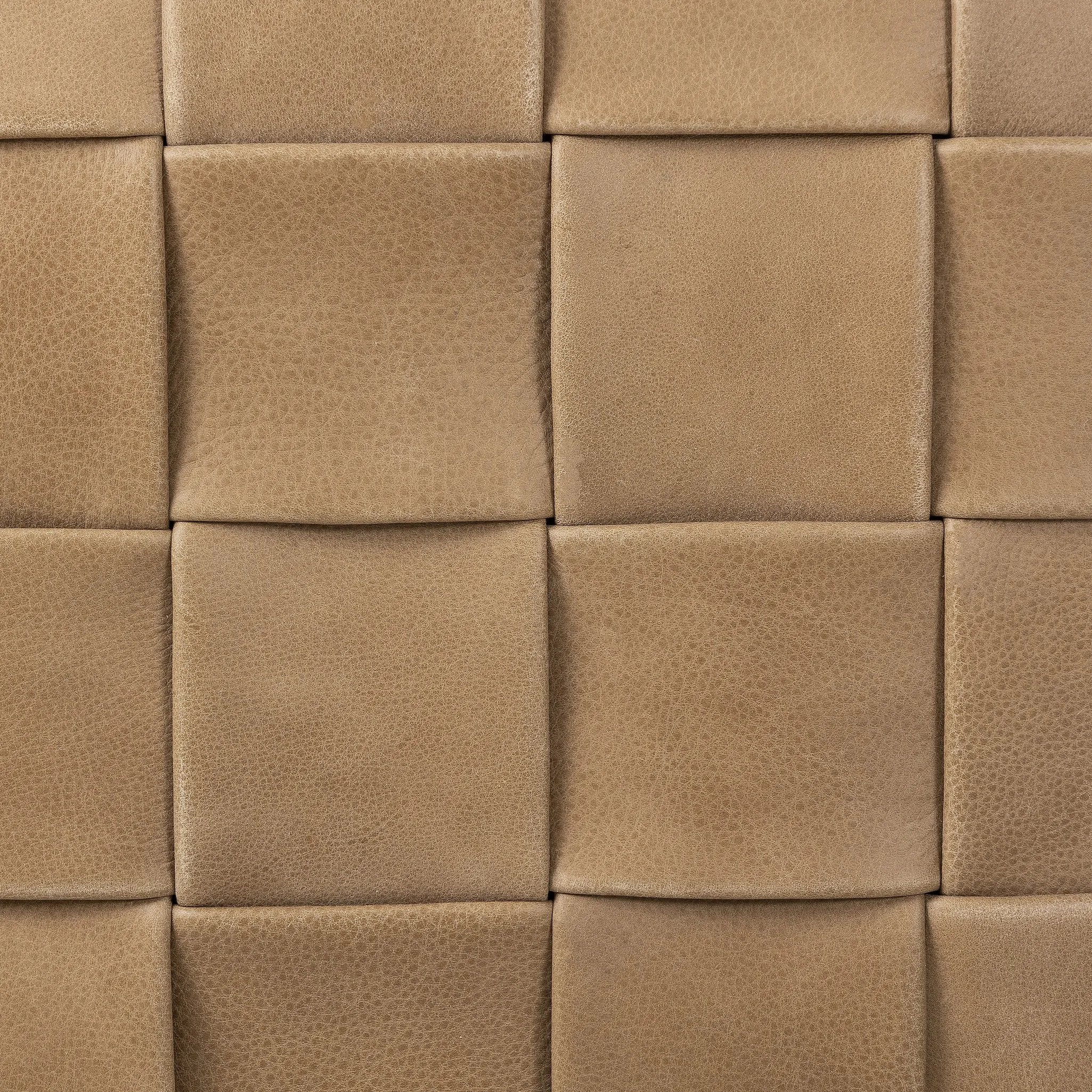 Featuring Flores Palermo Drift Ottoman by Four Hands at Amethyst Home. Soft, specialized top-grain leather is hand-woven, crafting a look of a treasured vintage find. Use as bonus seating or style with a tray for an extra surface.Overall Dimensions: 19.50"w x 19.50"d x 17.00"hWeight : 31.31 lbsMaterials: Top Grain Leather, Solid Oak, 100% Polyester. Amethyst Home provides interior design, new home construction design consulting, vintage area rugs, and lighting in the Charlotte metro area.