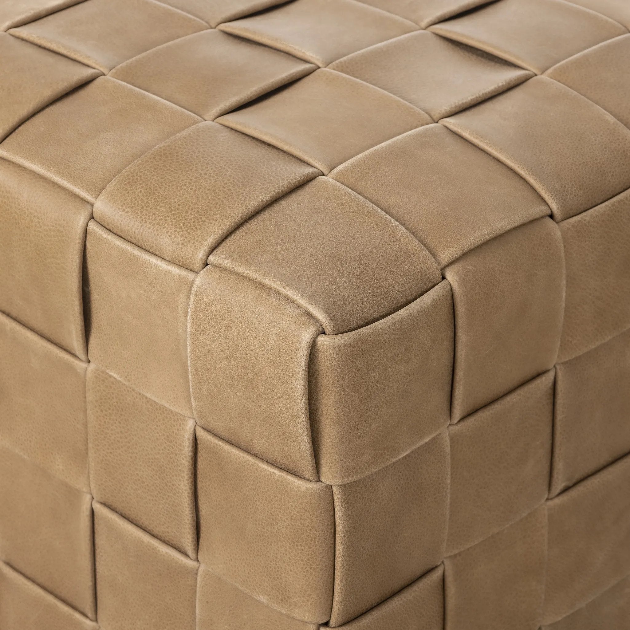 Featuring Flores Palermo Drift Ottoman by Four Hands at Amethyst Home. Soft, specialized top-grain leather is hand-woven, crafting a look of a treasured vintage find. Use as bonus seating or style with a tray for an extra surface.Overall Dimensions: 19.50"w x 19.50"d x 17.00"hWeight : 31.31 lbsMaterials: Top Grain Leather, Solid Oak, 100% Polyester. Amethyst Home provides interior design, new home construction design consulting, vintage area rugs, and lighting in the Los Angeles metro area.