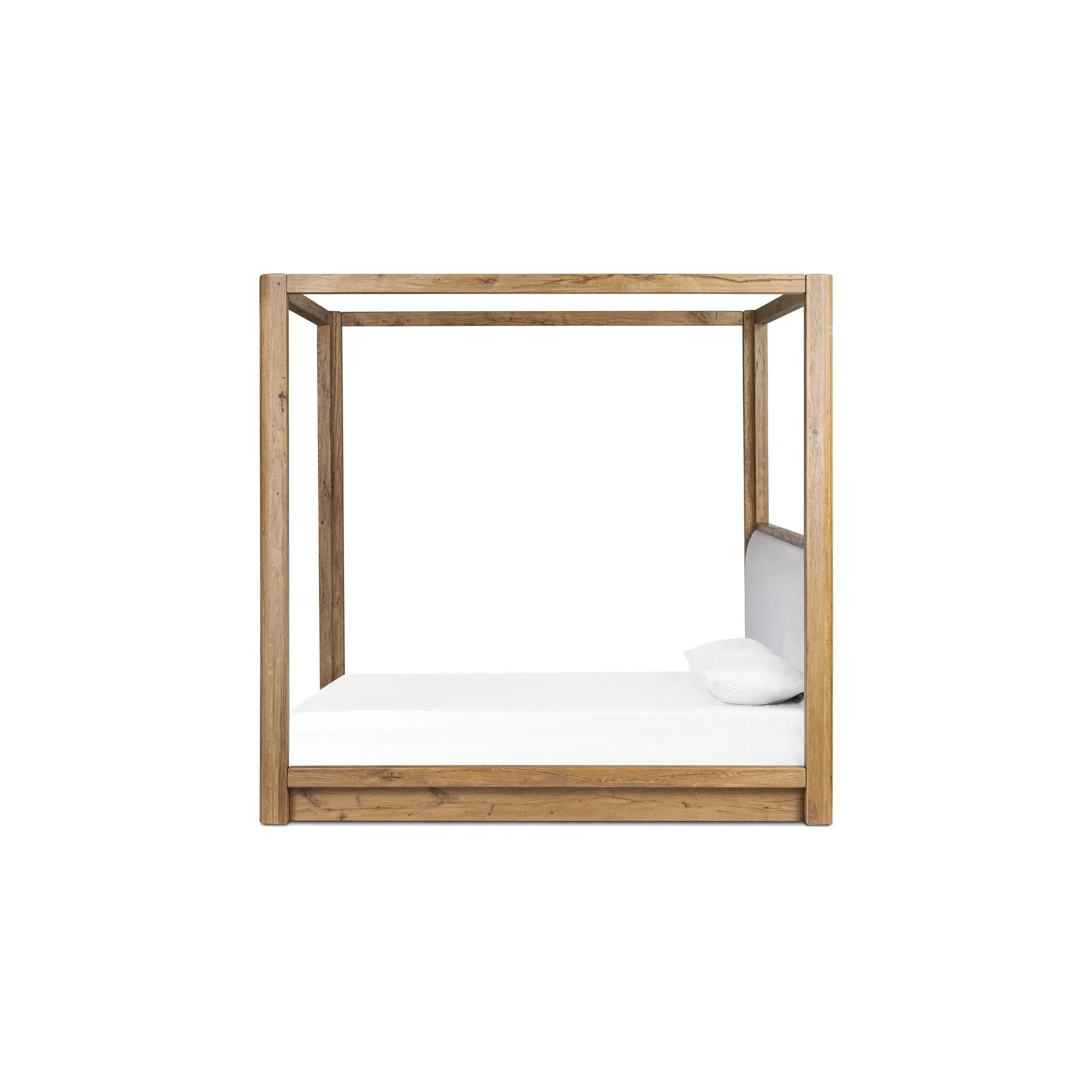 Minimalist and modern, this platform-style canopy bed is framed to a low profile and softened with an upholstered headboard. The character-rich oak's rounded corners and light brown finish add to the bed's fresh appeal Amethyst Home provides interior design, new home construction design consulting, vintage area rugs, and lighting in the Houston metro area.