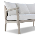 Dove-grey teak with a washed finish, linen-like upholstery and a braided woven seatback blend together for a monochromatic look on this outdoor sofa, perfect for small spaces. The slightly sun-aged look comes together for a style that evokes coastal vibes. Cover or store inside during inclement weather or when not in use. Amethyst Home provides interior design, new home construction design consulting, vintage area rugs, and lighting in the Calabasas metro area.