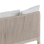 Dove-grey teak with a washed finish, linen-like upholstery and a braided woven seatback blend together for a monochromatic look on this outdoor sofa, perfect for small spaces. The slightly sun-aged look comes together for a style that evokes coastal vibes. Cover or store inside during inclement weather or when not in use. Amethyst Home provides interior design, new home construction design consulting, vintage area rugs, and lighting in the Dallas metro area.