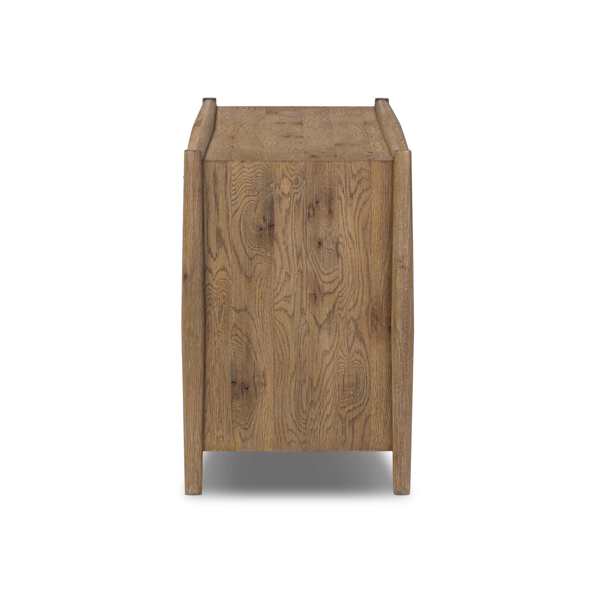 The traditional spindle structure brought to modern speed. Made from weathered oak, the sideboard brings generous storage space to dining and entertaining, working into a range of spaces and collections with ease. Simple cylindrical hardware is finished in an aged bronze Amethyst Home provides interior design, new home construction design consulting, vintage area rugs, and lighting in the Monterey metro area.