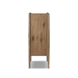 A rustic oak bar cabinet shapes subtly curved corners, bringing a handcrafted look to a minimalist form. Fixed center shelves, functional drawers and glass fronts for open display. Simple hardware is finished in an aged bronze Amethyst Home provides interior design, new home construction design consulting, vintage area rugs, and lighting in the Charlotte metro area.