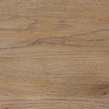 A rustic oak bar cabinet shapes subtly curved corners, bringing a handcrafted look to a minimalist form. Fixed center shelves, functional drawers and glass fronts for open display. Simple hardware is finished in an aged bronze Amethyst Home provides interior design, new home construction design consulting, vintage area rugs, and lighting in the Omaha metro area.