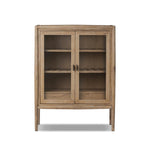 A rustic oak bar cabinet shapes subtly curved corners, bringing a handcrafted look to a minimalist form. Fixed center shelves, functional drawers and glass fronts for open display. Simple hardware is finished in an aged bronze Amethyst Home provides interior design, new home construction design consulting, vintage area rugs, and lighting in the Portland metro area.