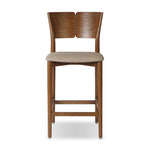 Inspired by simple Scandinavian styling, a tan-finished parawood stool's slit-back metal inlay adds a decorative touch. Easy curves from bent wood give a smooth silhouette. Sized for the counter and upholstered with a thin seat cushion in linen-cotton taupe Amethyst Home provides interior design, new home construction design consulting, vintage area rugs, and lighting in the Dallas metro area.