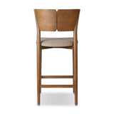 Inspired by simple Scandinavian styling, a tan-finished parawood stool's slit-back metal inlay adds a decorative touch. Easy curves from bent wood give a smooth silhouette. Sized for the counter and upholstered with a thin seat cushion in linen-cotton taupe Amethyst Home provides interior design, new home construction design consulting, vintage area rugs, and lighting in the Salt Lake City metro area.