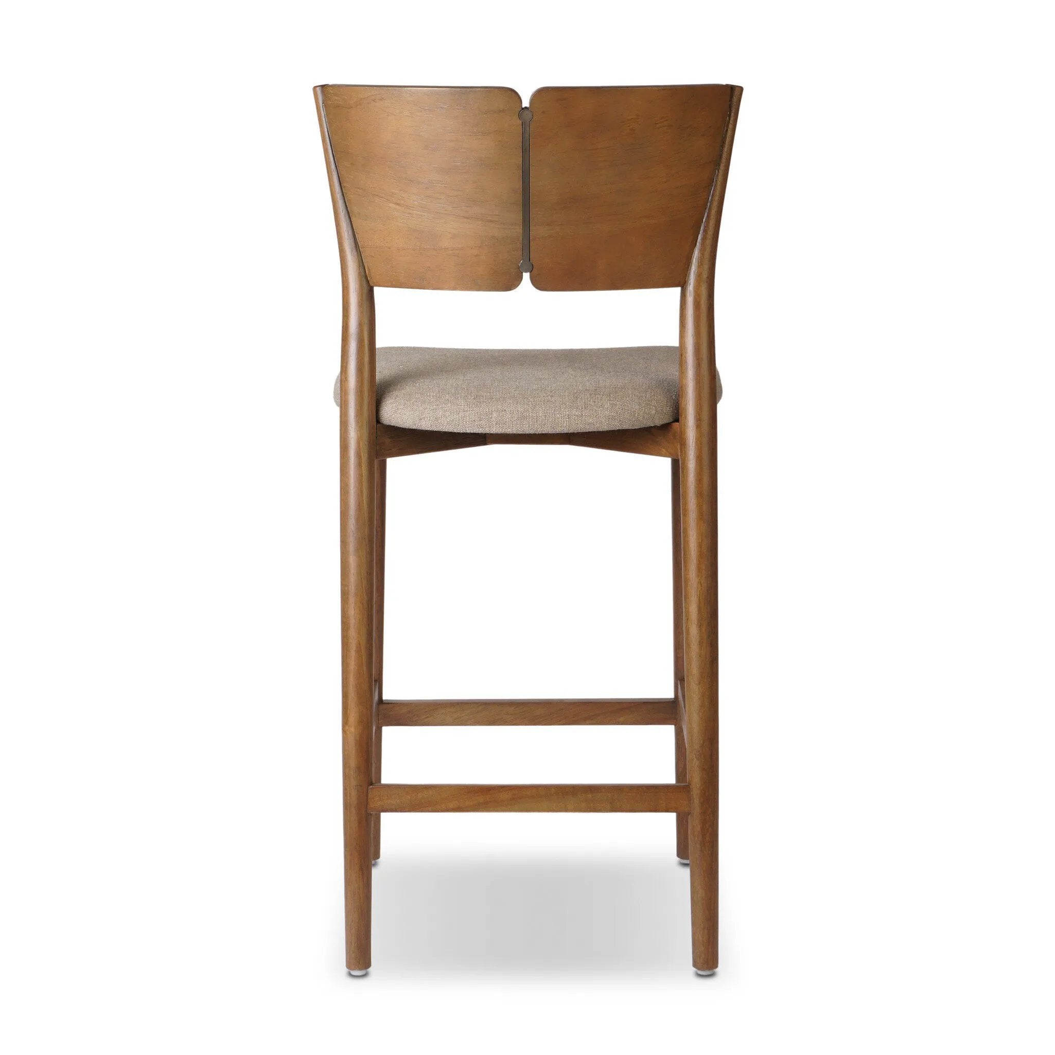 Inspired by simple Scandinavian styling, a tan-finished parawood stool's slit-back metal inlay adds a decorative touch. Easy curves from bent wood give a smooth silhouette. Sized for the counter and upholstered with a thin seat cushion in linen-cotton taupe Amethyst Home provides interior design, new home construction design consulting, vintage area rugs, and lighting in the Salt Lake City metro area.