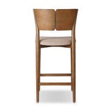 Inspired by simple Scandinavian styling, a tan-finished parawood stool's slit-back metal inlay adds a decorative touch. Easy curves from bent wood give a smooth silhouette. Sized for the counter and upholstered with a thin seat cushion in linen-cotton taupe Amethyst Home provides interior design, new home construction design consulting, vintage area rugs, and lighting in the San Diego metro area.