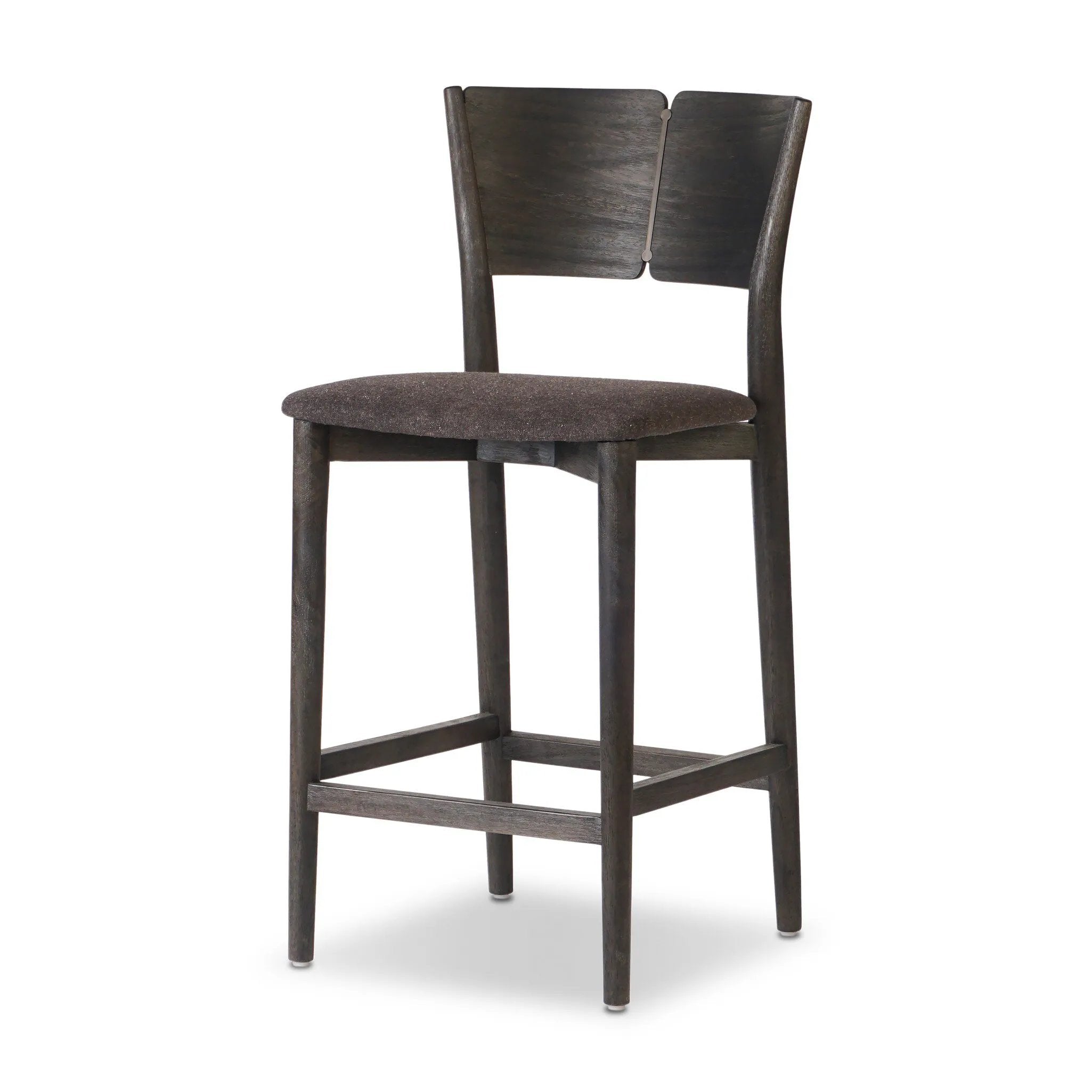 Inspired by simple Scandinavian styling, a dark-finished parawood stool's slit-back metal inlay adds a decorative touch. Easy curves from bent wood give a smooth silhouette. Sized for the counter and upholstered with a thin seat cushion upholstered in black performance fabric, perfect for dining or entertaining. Amethyst Home provides interior design, new home construction design consulting, vintage area rugs, and lighting in the Des Moines metro area.