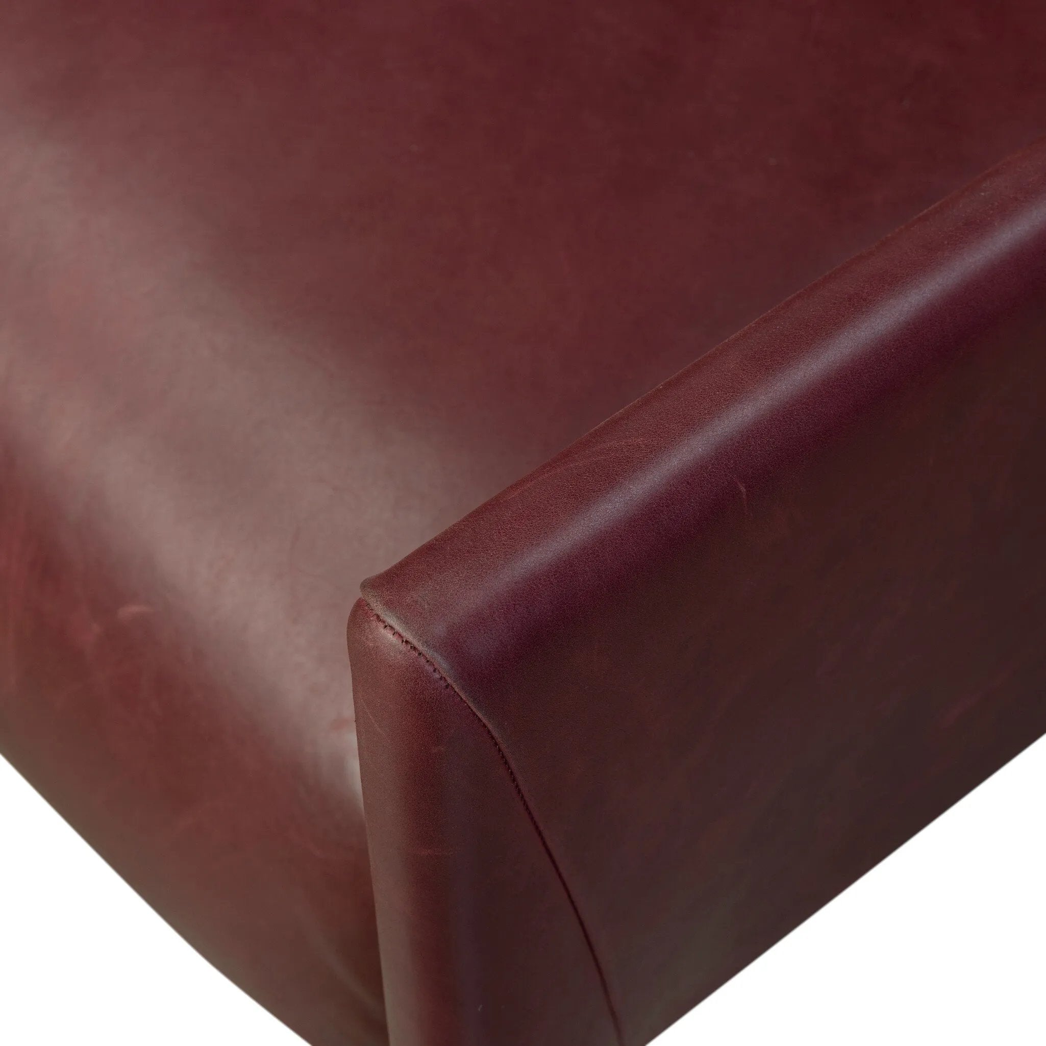 A bold chair design inspired by Italian modernism. Made from burgundy top-grain leather, with a wide format that contrasts slimmer chamfered legs leaving airiness underneath. The result: A beautiful balance of scale.As enthusiasts of clean aesthetics at Amethyst, we love the warm modern inspired Graford Chair - Dulane Burgundy. Amethyst Home provides interior design, new home construction design consulting, vintage area rugs, and lighting in the Monterey metro area.