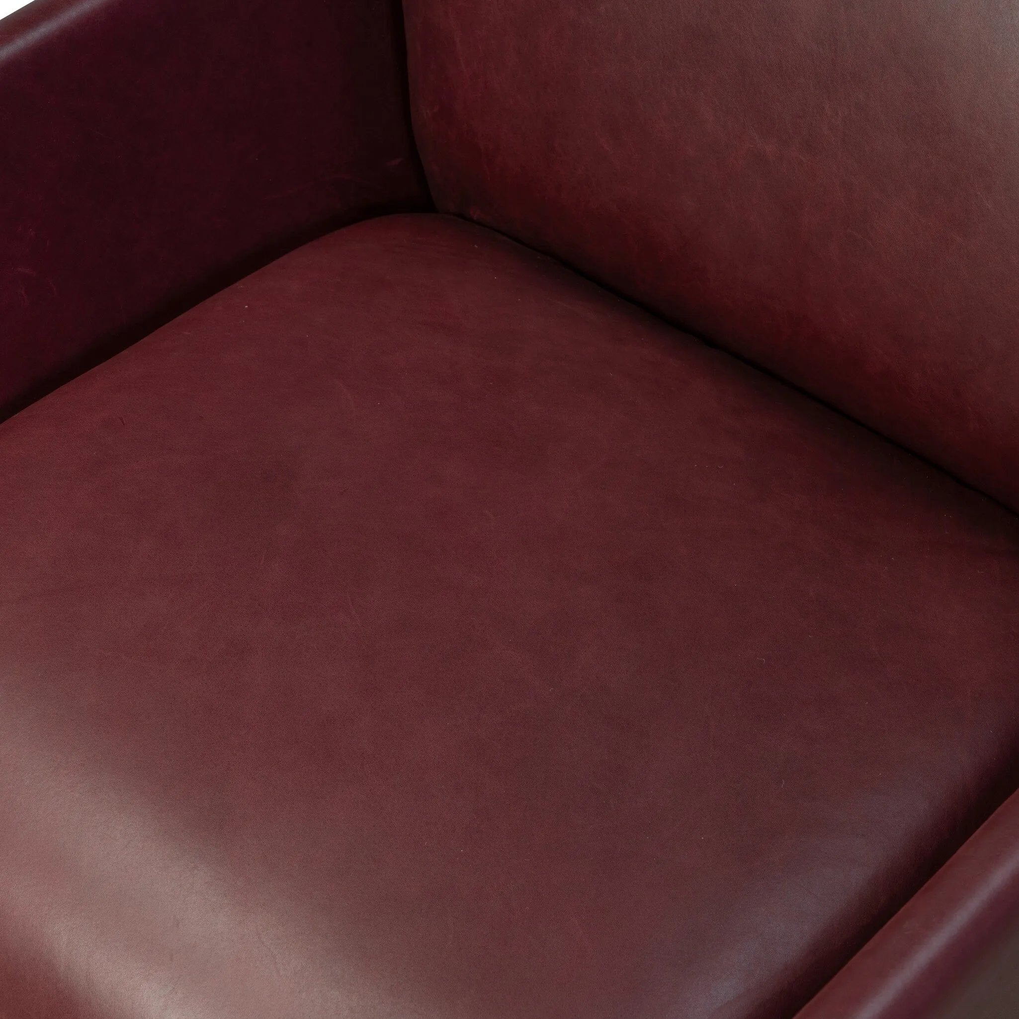 A bold chair design inspired by Italian modernism. Made from burgundy top-grain leather, with a wide format that contrasts slimmer chamfered legs leaving airiness underneath. The result: A beautiful balance of scale.As enthusiasts of clean aesthetics at Amethyst, we love the warm modern inspired Graford Chair - Dulane Burgundy. Amethyst Home provides interior design, new home construction design consulting, vintage area rugs, and lighting in the Park City metro area.