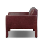 A bold chair design inspired by Italian modernism. Made from burgundy top-grain leather, with a wide format that contrasts slimmer chamfered legs leaving airiness underneath. The result: A beautiful balance of scale.As enthusiasts of clean aesthetics at Amethyst, we love the warm modern inspired Graford Chair - Dulane Burgundy. Amethyst Home provides interior design, new home construction design consulting, vintage area rugs, and lighting in the San Diego metro area.