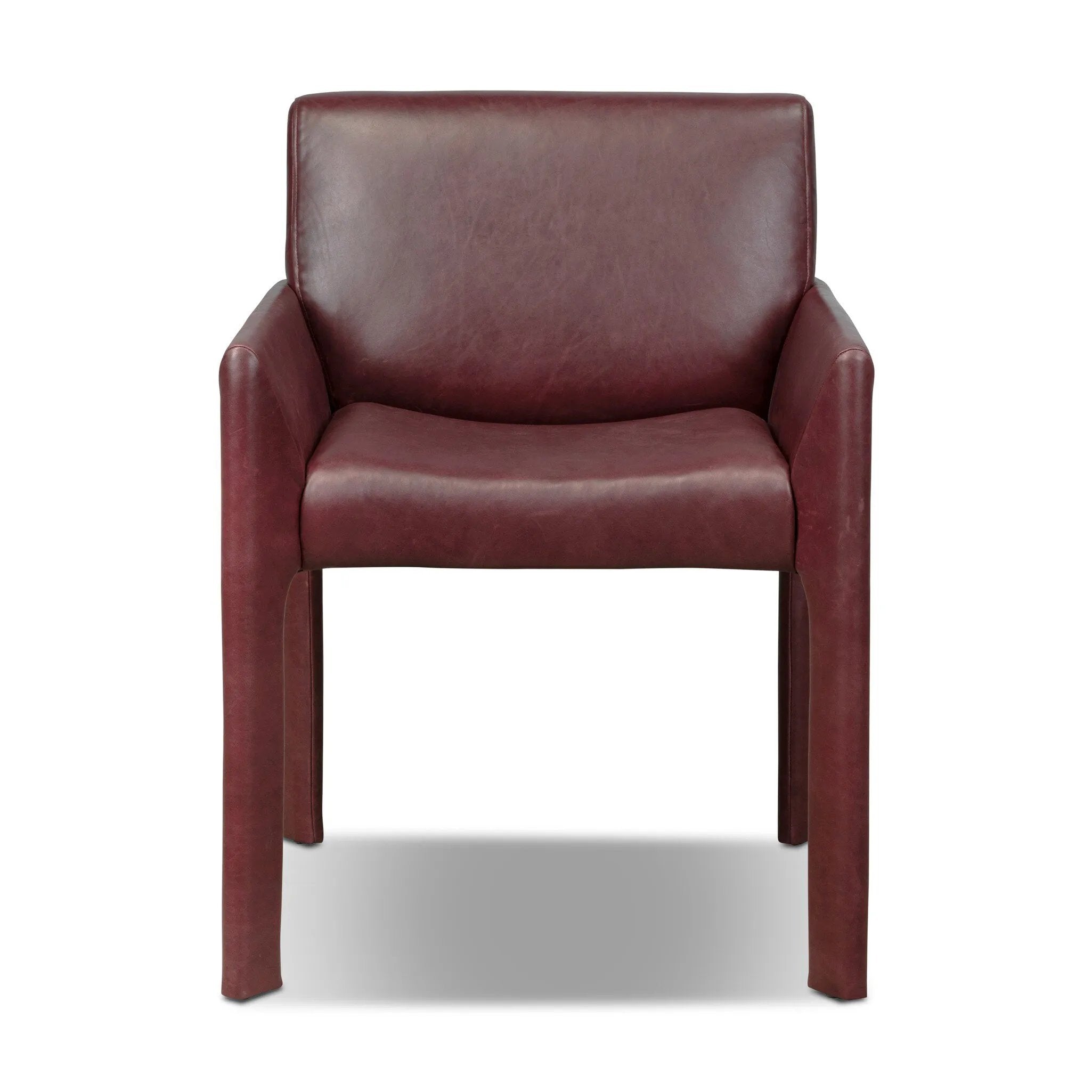 A bold dining chair design inspired by Italian modernism. Made from burgundy top-grain leather, with a wide format that contrasts slimmer chamfered legs leaving airiness underneath. The result: A beautiful balance of scale.As enthusiasts of luxe aesthetics at Amethyst, we love the warm modern inspired Graford Dining Chair - Dulane Burgundy. Amethyst Home provides interior design, new home construction design consulting, vintage area rugs, and lighting in the Alpharetta metro area.