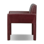 A bold dining chair design inspired by Italian modernism. Made from burgundy top-grain leather, with a wide format that contrasts slimmer chamfered legs leaving airiness underneath. The result: A beautiful balance of scale.As enthusiasts of luxe aesthetics at Amethyst, we love the warm modern inspired Graford Dining Chair - Dulane Burgundy. Amethyst Home provides interior design, new home construction design consulting, vintage area rugs, and lighting in the Boston metro area.
