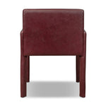 A bold dining chair design inspired by Italian modernism. Made from burgundy top-grain leather, with a wide format that contrasts slimmer chamfered legs leaving airiness underneath. The result: A beautiful balance of scale.As enthusiasts of luxe aesthetics at Amethyst, we love the warm modern inspired Graford Dining Chair - Dulane Burgundy. Amethyst Home provides interior design, new home construction design consulting, vintage area rugs, and lighting in the Monterey metro area.