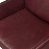 A bold dining chair design inspired by Italian modernism. Made from burgundy top-grain leather, with a wide format that contrasts slimmer chamfered legs leaving airiness underneath. The result: A beautiful balance of scale.As enthusiasts of luxe aesthetics at Amethyst, we love the warm modern inspired Graford Dining Chair - Dulane Burgundy. Amethyst Home provides interior design, new home construction design consulting, vintage area rugs, and lighting in the Omaha metro area.