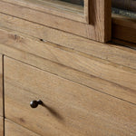 Large, traditional cabinetry of honey-finished oak brings a timeless look — and plenty of storage — to any room in the house. Sliding glass doors modernize this heritage-inspired piece, so you can style your favorite books and belongings. Six roomy drawers create endless storage possibilities for your space Amethyst Home provides interior design, new home construction design consulting, vintage area rugs, and lighting in the Austin metro area.