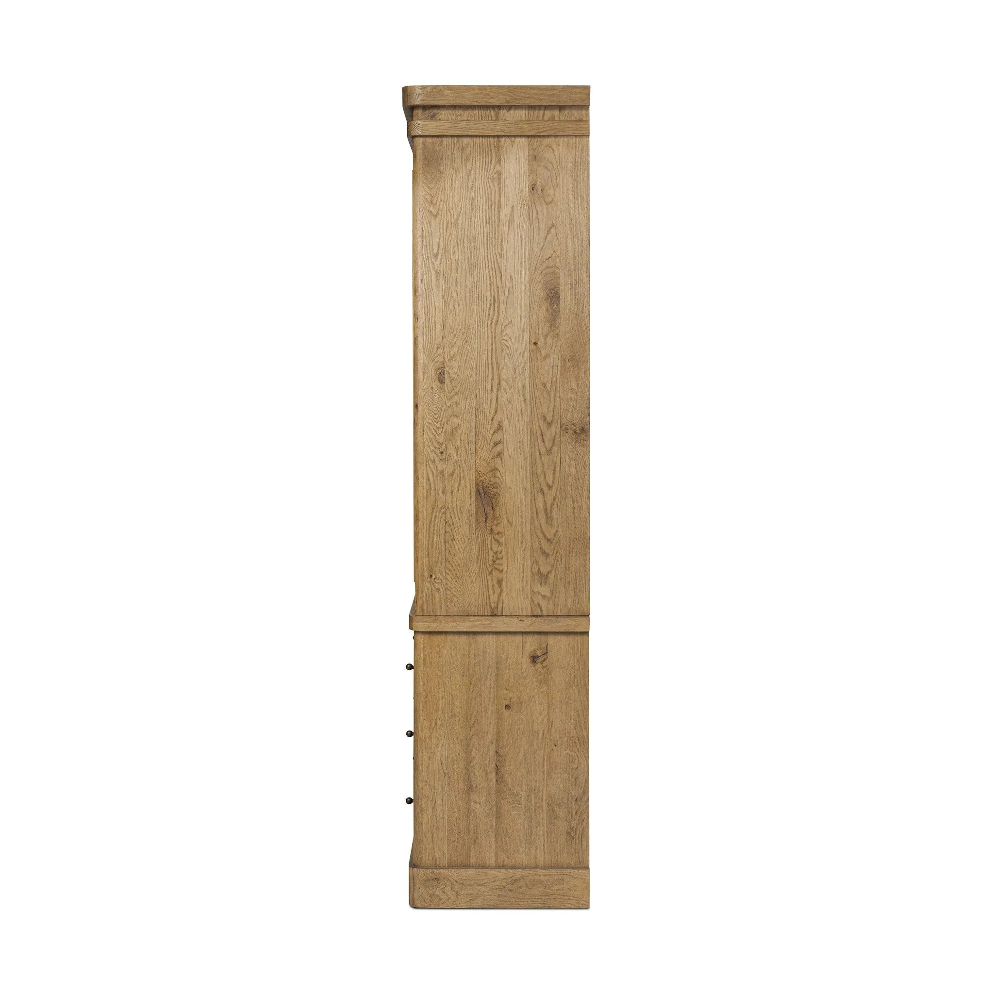 Large, traditional cabinetry of honey-finished oak brings a timeless look — and plenty of storage — to any room in the house. Sliding glass doors modernize this heritage-inspired piece, so you can style your favorite books and belongings. Six roomy drawers create endless storage possibilities for your space Amethyst Home provides interior design, new home construction design consulting, vintage area rugs, and lighting in the Dallas metro area.