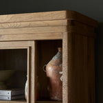 Large, traditional cabinetry of honey-finished oak brings a timeless look — and plenty of storage — to any room in the house. Sliding glass doors modernize this heritage-inspired piece, so you can style your favorite books and belongings. Six roomy drawers create endless storage possibilities for your space Amethyst Home provides interior design, new home construction design consulting, vintage area rugs, and lighting in the Des Moines metro area.