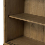 Large, traditional cabinetry of honey-finished oak brings a timeless look — and plenty of storage — to any room in the house. Sliding glass doors modernize this heritage-inspired piece, so you can style your favorite books and belongings. Six roomy drawers create endless storage possibilities for your space Amethyst Home provides interior design, new home construction design consulting, vintage area rugs, and lighting in the Park City metro area.