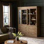 Large, traditional cabinetry of honey-finished oak brings a timeless look — and plenty of storage — to any room in the house. Sliding glass doors modernize this heritage-inspired piece, so you can style your favorite books and belongings. Six roomy drawers create endless storage possibilities for your space Amethyst Home provides interior design, new home construction design consulting, vintage area rugs, and lighting in the Portland metro area.