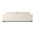 Welcome to the modern lounging essential. A timeless track arm sofa is upholstered in a neutral oatmeal performance fabric and finished with wooden block legs. Performance fabrics are specially created to withstand spills, stains, high traffic and wear, ensuring long-term comfort and unmatched durability Amethyst Home provides interior design, new home construction design consulting, vintage area rugs, and lighting in the Alpharetta metro area.