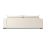Welcome to the modern lounging essential. A timeless track arm sofa is upholstered in a neutral oatmeal performance fabric and finished with wooden block legs. Performance fabrics are specially created to withstand spills, stains, high traffic and wear, ensuring long-term comfort and unmatched durability Amethyst Home provides interior design, new home construction design consulting, vintage area rugs, and lighting in the Alpharetta metro area.
