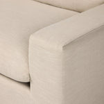 Welcome to the modern lounging essential. A timeless track arm sofa is upholstered in a neutral oatmeal performance fabric and finished with wooden block legs. Performance fabrics are specially created to withstand spills, stains, high traffic and wear, ensuring long-term comfort and unmatched durability Amethyst Home provides interior design, new home construction design consulting, vintage area rugs, and lighting in the Dallas metro area.
