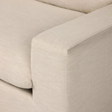 Welcome to the modern lounging essential. A timeless track arm sofa is upholstered in a neutral oatmeal performance fabric and finished with wooden block legs. Performance fabrics are specially created to withstand spills, stains, high traffic and wear, ensuring long-term comfort and unmatched durability Amethyst Home provides interior design, new home construction design consulting, vintage area rugs, and lighting in the Dallas metro area.