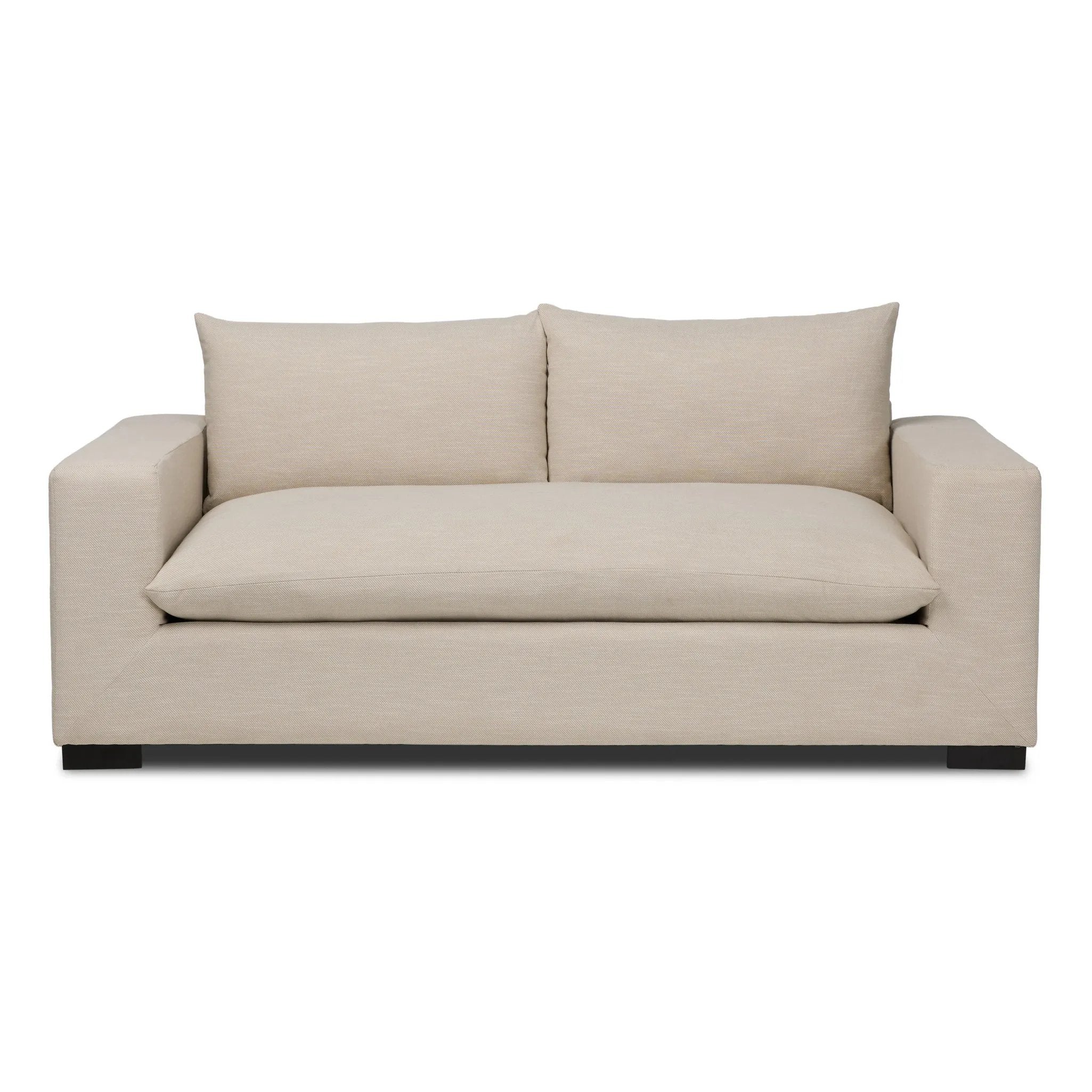 Welcome to the modern lounging essential. A timeless track arm sofa is upholstered in a neutral oatmeal performance fabric and finished with wooden block legs. Performance fabrics are specially created to withstand spills, stains, high traffic and wear, ensuring long-term comfort and unmatched durability Amethyst Home provides interior design, new home construction design consulting, vintage area rugs, and lighting in the Des Moines metro area.