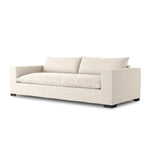Welcome to the modern lounging essential. A timeless track arm sofa is upholstered in a neutral oatmeal performance fabric and finished with wooden block legs. Performance fabrics are specially created to withstand spills, stains, high traffic and wear, ensuring long-term comfort and unmatched durability Amethyst Home provides interior design, new home construction design consulting, vintage area rugs, and lighting in the Washington metro area.