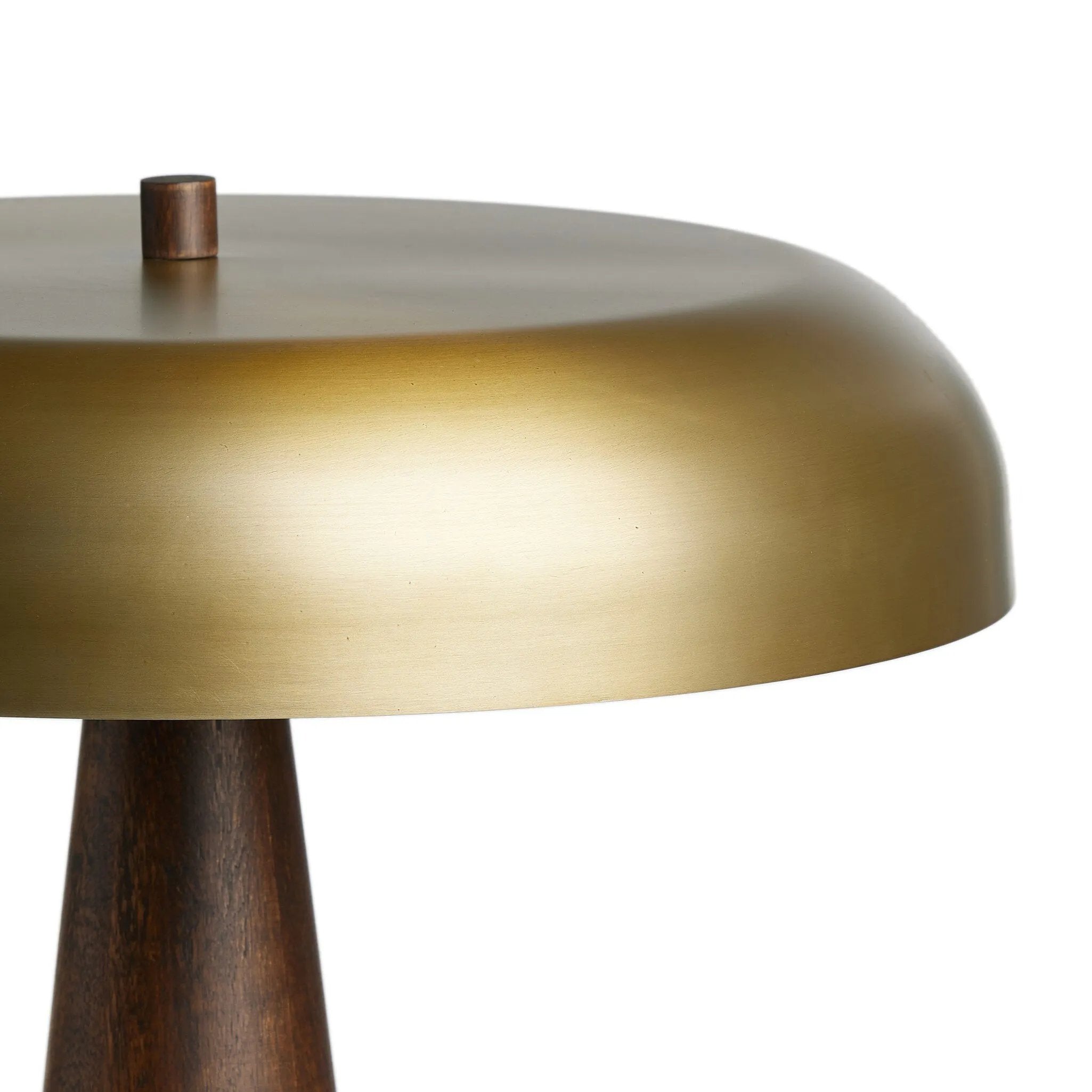 A stylish nod to midcentury mushroom lamps, this beautifully scaled wooden lamp features a gleaming metal shade finished in aged brass. It's topped with a small wood finial to complete the look Amethyst Home provides interior design, new home construction design consulting, vintage area rugs, and lighting in the Nashville metro area.